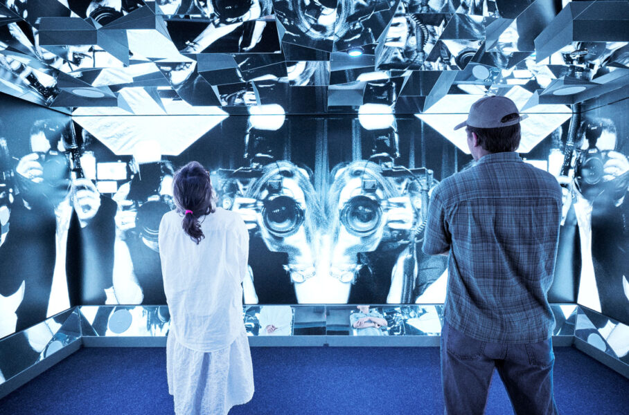 Two visitors in the Mirror Room at Avicii Experience