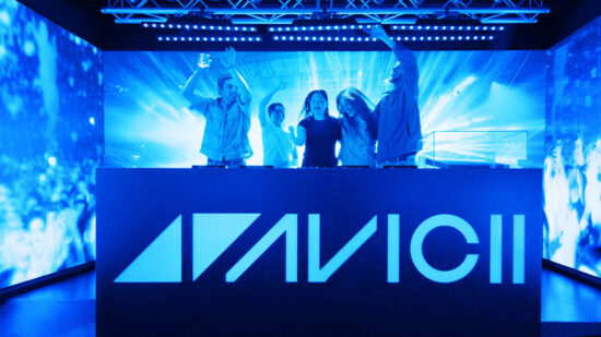 Four friends in the Concert Room at Avicii Experience.